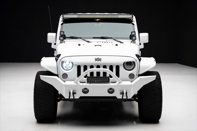 used 2016 Jeep Wrangler Unlimited car, priced at $23,999