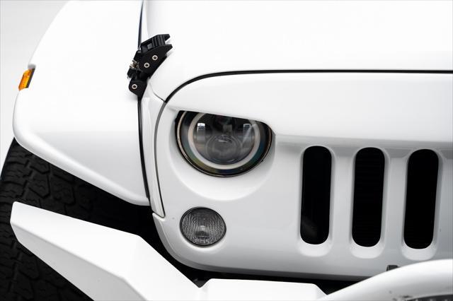 used 2016 Jeep Wrangler Unlimited car, priced at $23,999