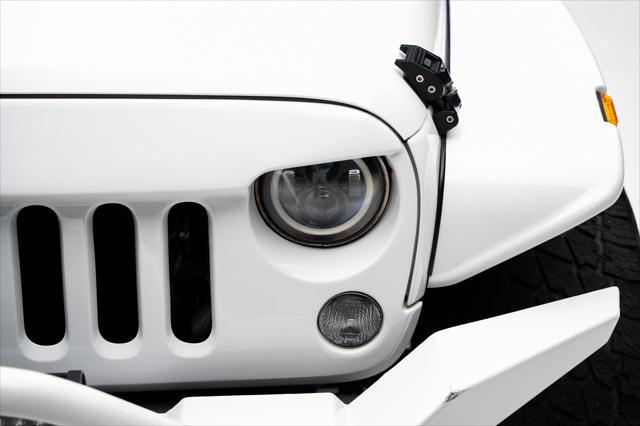 used 2016 Jeep Wrangler Unlimited car, priced at $23,999