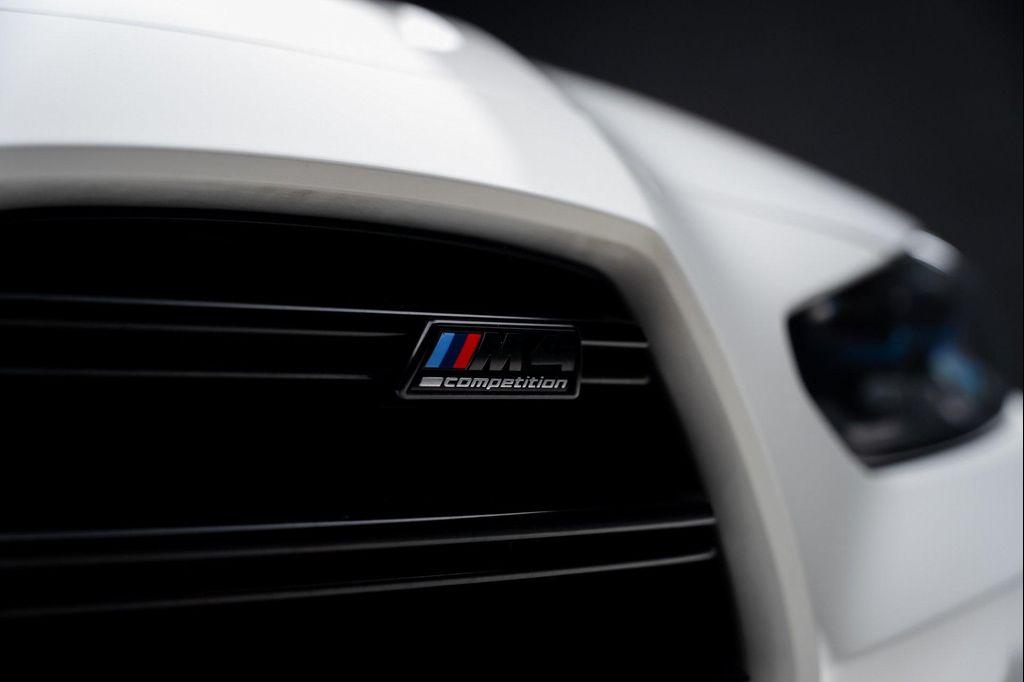 used 2022 BMW M4 car, priced at $65,999