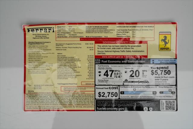 used 2023 Ferrari 296 GTS car, priced at $409,999