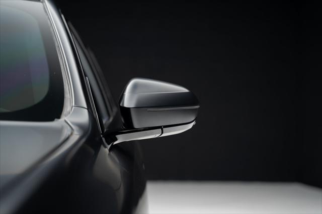 used 2024 BMW 750e car, priced at $94,999