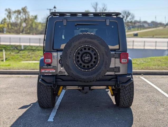 used 2016 Jeep Wrangler Unlimited car, priced at $19,999