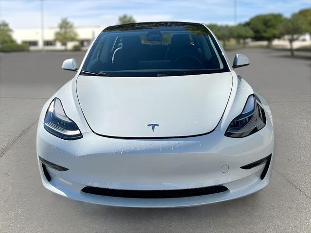 used 2023 Tesla Model 3 car, priced at $27,691