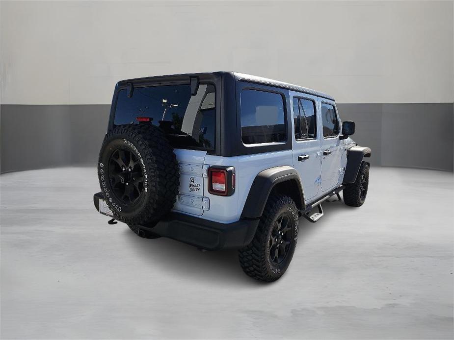 used 2021 Jeep Wrangler Unlimited car, priced at $37,957