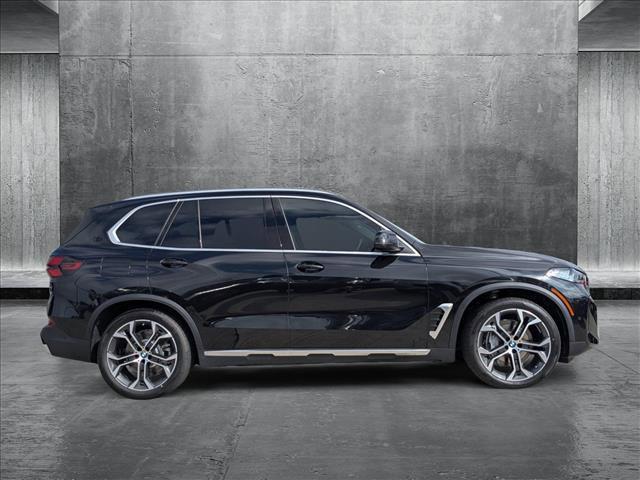 used 2025 BMW X5 PHEV car, priced at $77,110