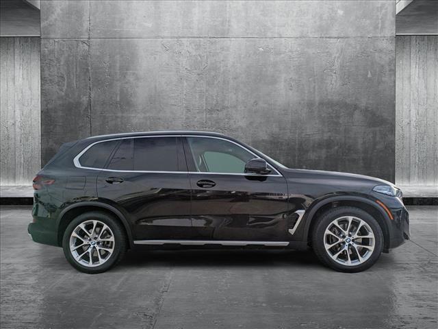 used 2024 BMW X5 car, priced at $56,995