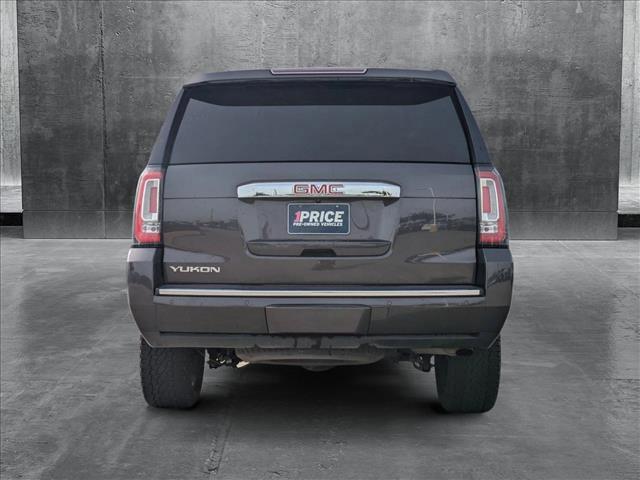 used 2018 GMC Yukon car, priced at $27,595