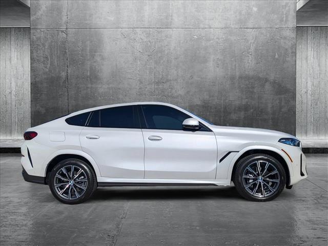 new 2025 BMW X6 car, priced at $77,875