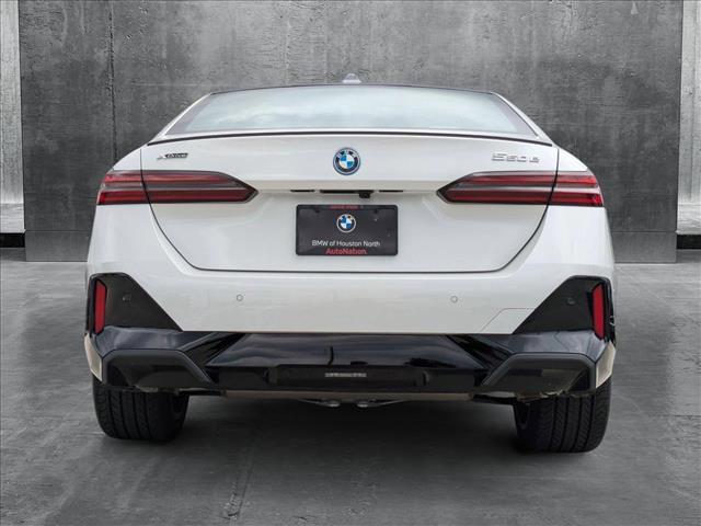 new 2026 BMW 550e car, priced at $79,265