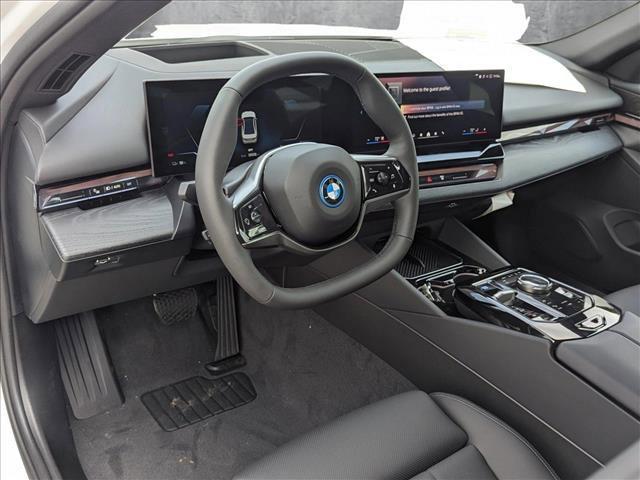 used 2024 BMW i5 car, priced at $59,277