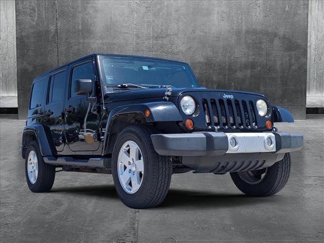 used 2012 Jeep Wrangler Unlimited car, priced at $15,995