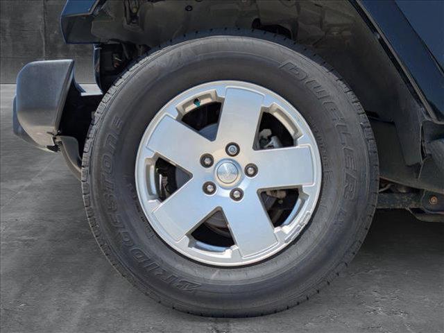used 2012 Jeep Wrangler Unlimited car, priced at $15,995