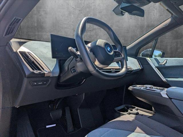 used 2024 BMW iX car, priced at $58,995
