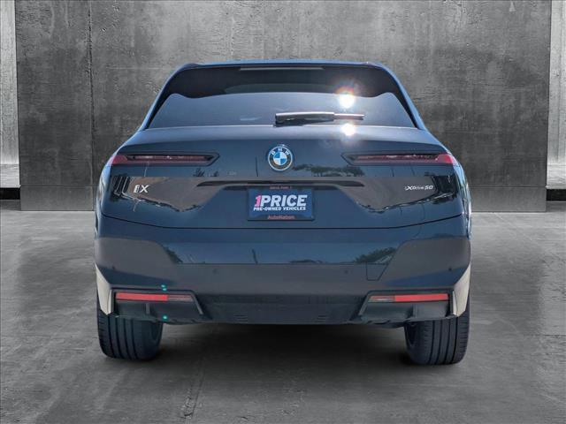 used 2024 BMW iX car, priced at $58,995