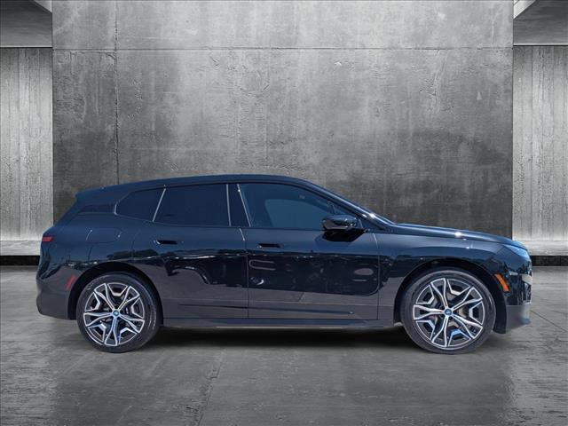 used 2024 BMW iX car, priced at $58,995