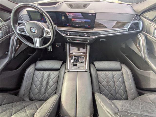 used 2024 BMW X6 car, priced at $62,995