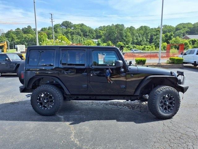 used 2012 Jeep Wrangler Unlimited car, priced at $13,900