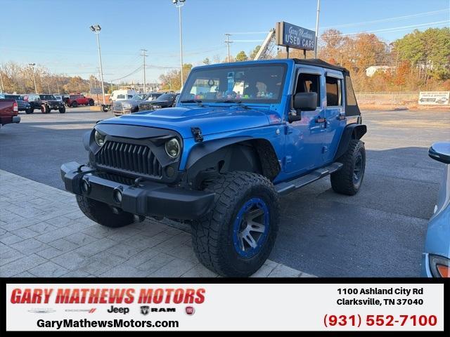 used 2014 Jeep Wrangler Unlimited car, priced at $13,900