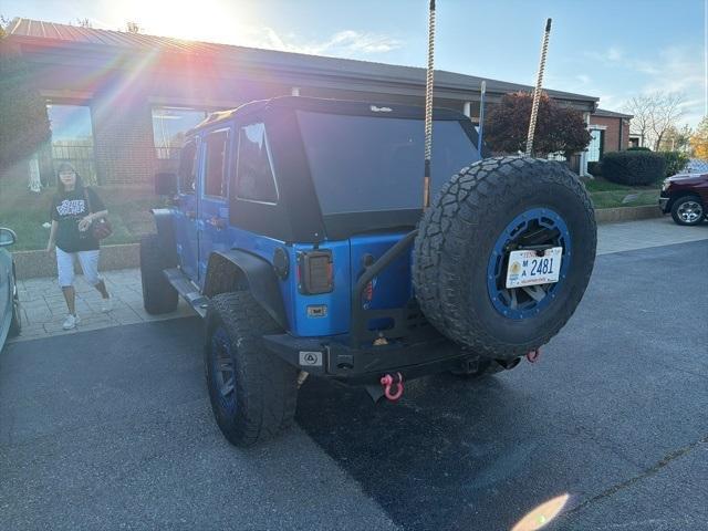 used 2014 Jeep Wrangler Unlimited car, priced at $13,900