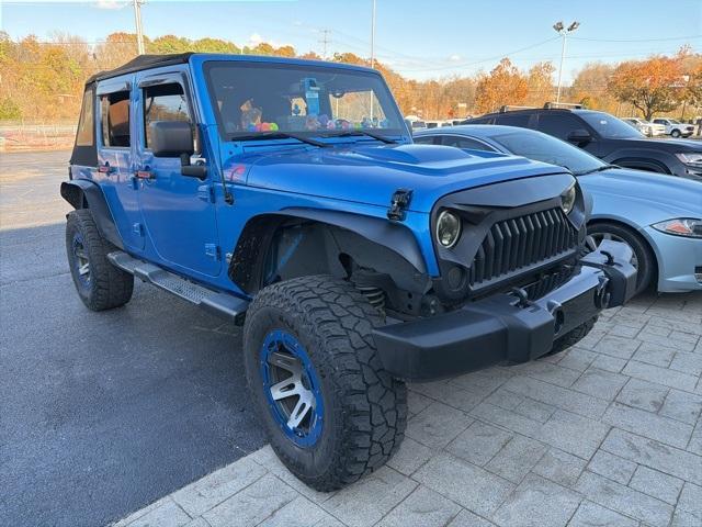 used 2014 Jeep Wrangler Unlimited car, priced at $13,900