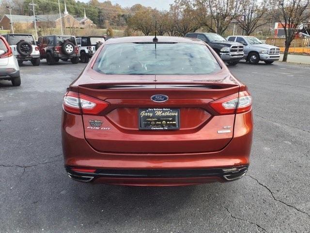 used 2014 Ford Fusion car, priced at $6,000