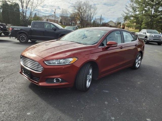 used 2014 Ford Fusion car, priced at $6,000