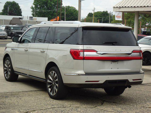 used 2021 Lincoln Navigator car, priced at $61,900