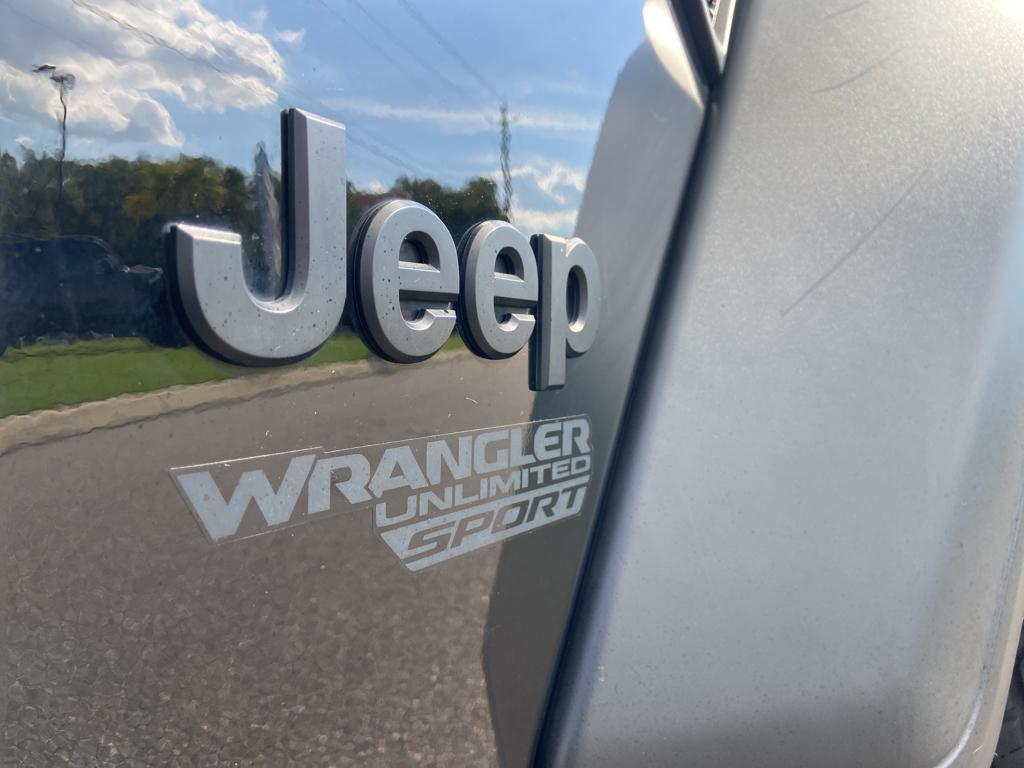 used 2021 Jeep Wrangler Unlimited car, priced at $32,982