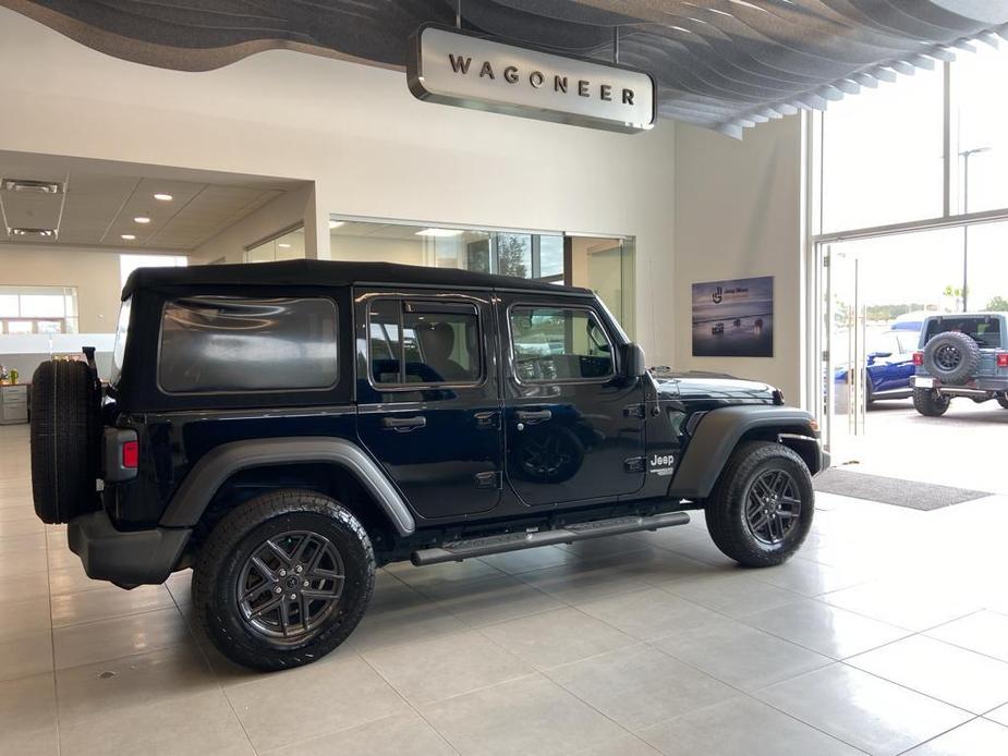 used 2021 Jeep Wrangler Unlimited car, priced at $31,339