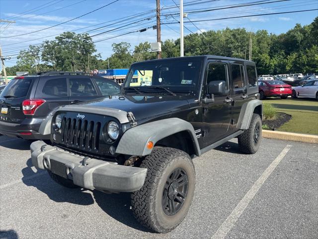 used 2015 Jeep Wrangler Unlimited car, priced at $15,287