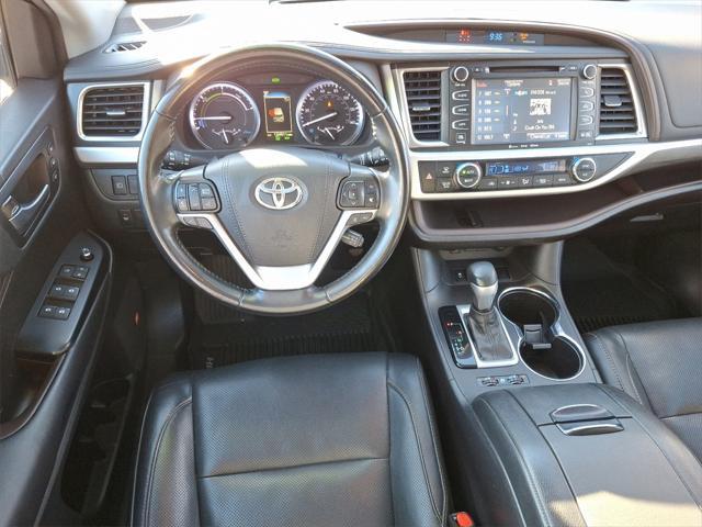 used 2019 Toyota Highlander Hybrid car, priced at $24,187