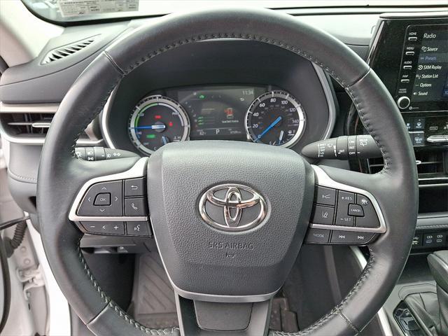 used 2022 Toyota Highlander Hybrid car, priced at $40,487