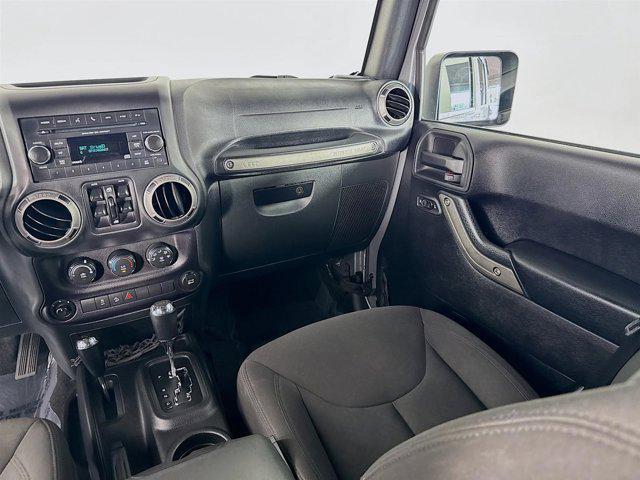 used 2016 Jeep Wrangler Unlimited car, priced at $20,991