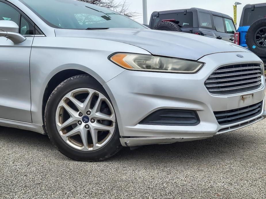 used 2014 Ford Fusion car, priced at $4,991