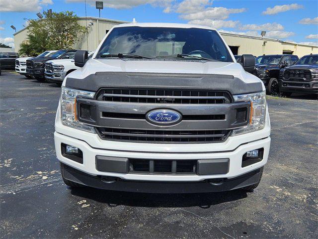 used 2018 Ford F-150 car, priced at $23,884