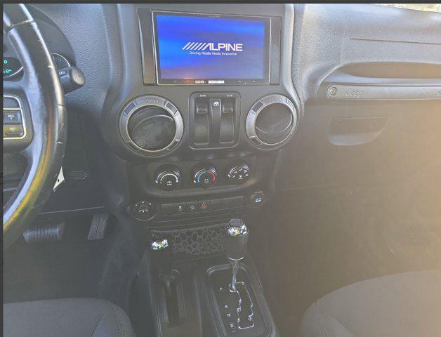 used 2016 Jeep Wrangler car, priced at $13,884