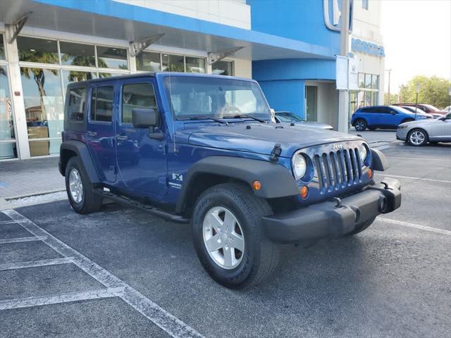 used 2009 Jeep Wrangler Unlimited car, priced at $12,816