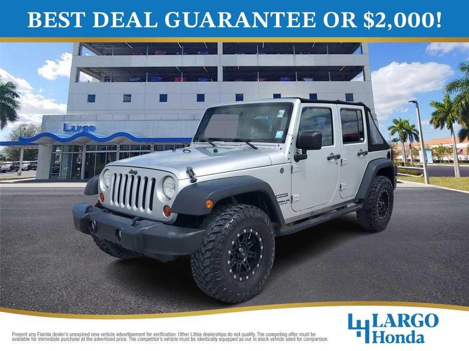 used 2010 Jeep Wrangler Unlimited car, priced at $12,919