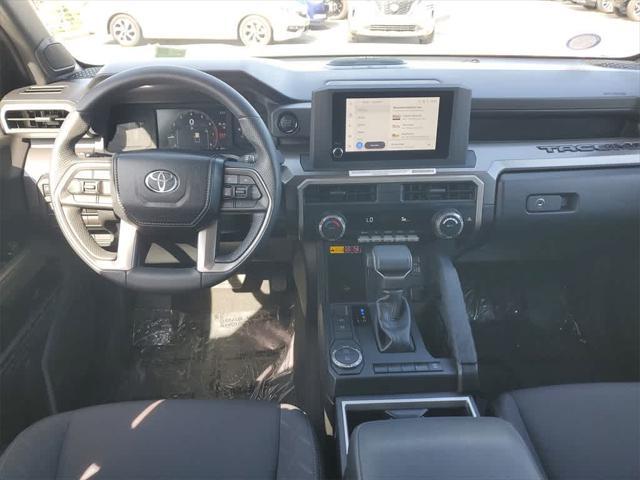 used 2024 Toyota Tacoma car, priced at $32,990