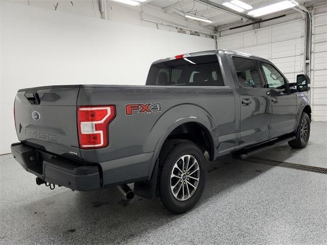 used 2018 Ford F-150 car, priced at $26,128