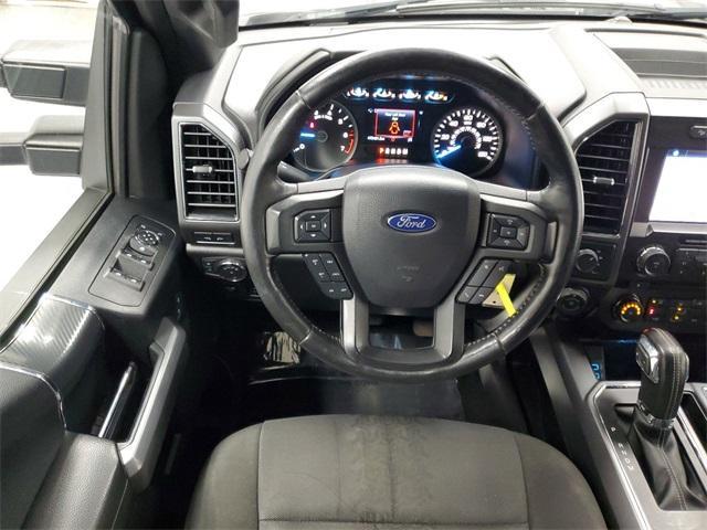 used 2018 Ford F-150 car, priced at $26,128