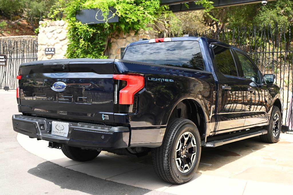 used 2023 Ford F-150 Lightning car, priced at $38,995