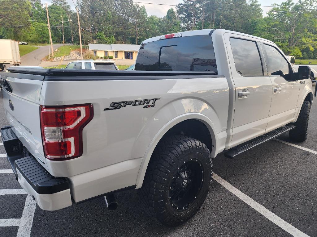 used 2019 Ford F-150 car, priced at $29,128