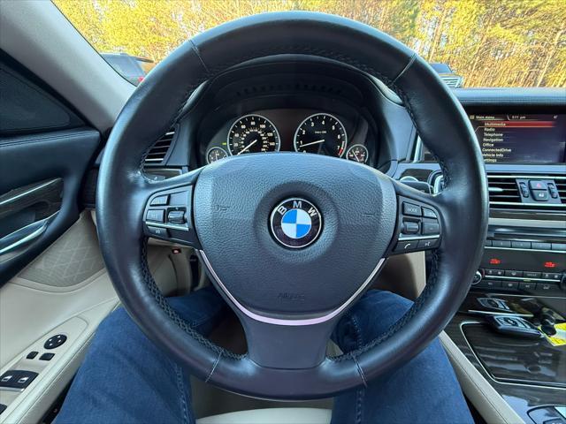used 2013 BMW 750 car, priced at $11,995