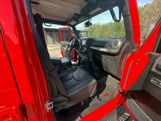 used 2014 Jeep Wrangler Unlimited car, priced at $25,995