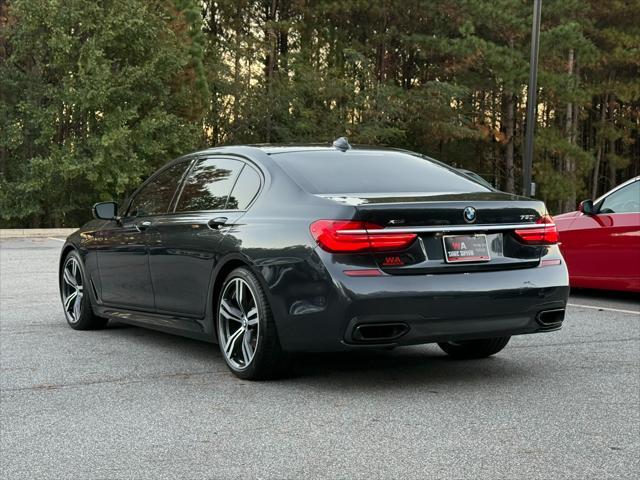 used 2016 BMW 750 car, priced at $26,995