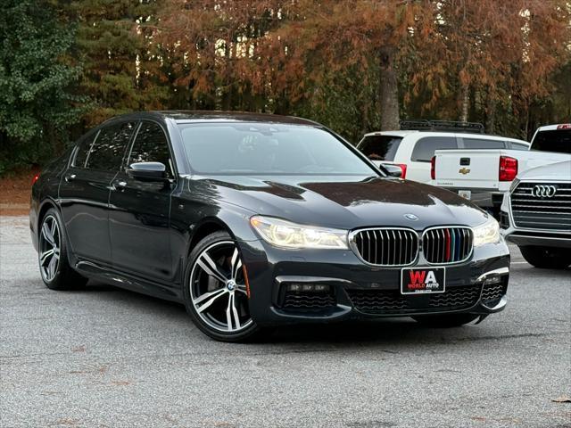 used 2016 BMW 750 car, priced at $26,995