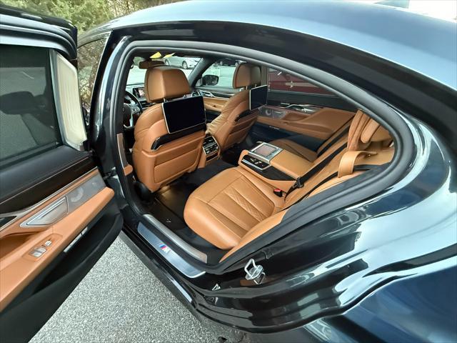 used 2016 BMW 750 car, priced at $26,995