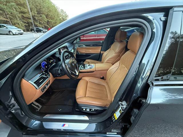 used 2016 BMW 750 car, priced at $26,995